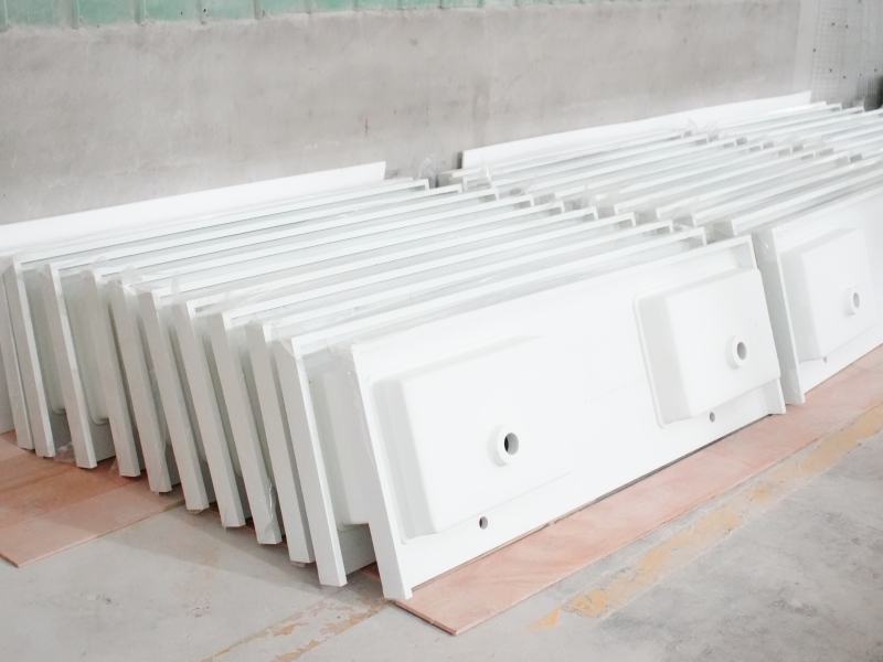 Undermount solid surface basin joined to quartz countertop Undermount solid surface basin joined to quartz countertop